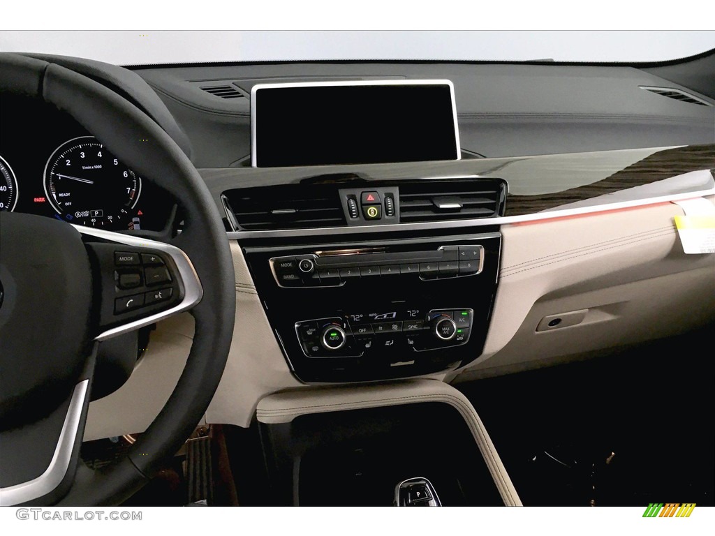 2020 X2 sDrive28i - Black Sapphire Metallic / Oyster/Black photo #5