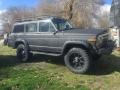 1986 Charcoal Metallic Jeep Grand Wagoneer   photo #1