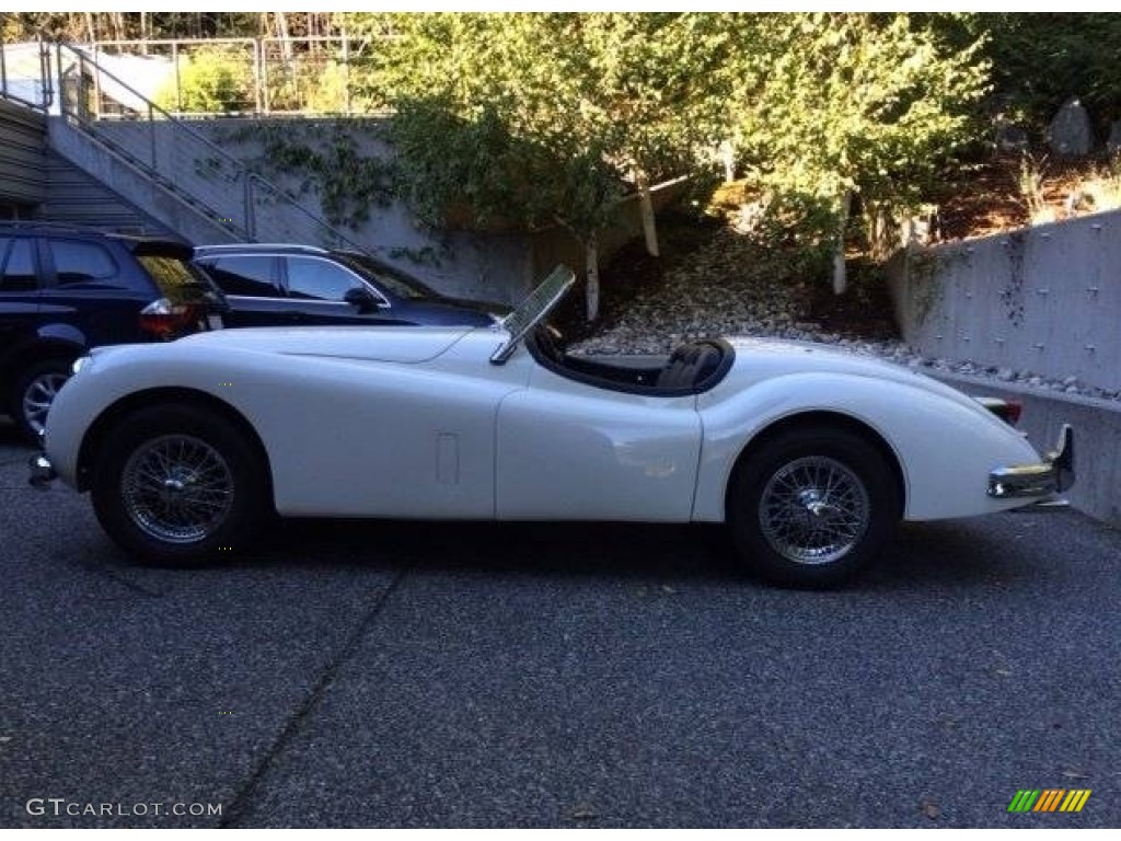 Old English White 1955 Jaguar XK-140 Roadster Exterior Photo #138565223