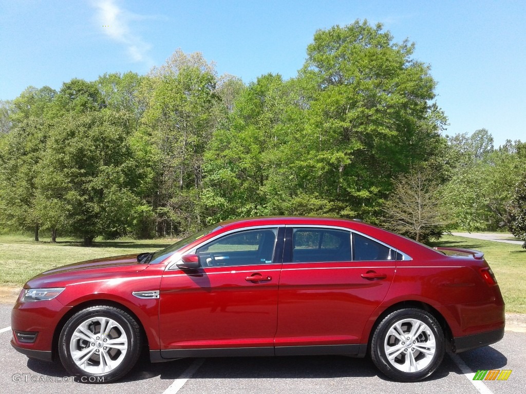 2016 Taurus SEL - Ruby Red / Charcoal Black photo #1