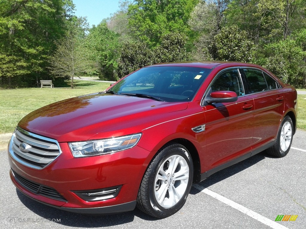 2016 Taurus SEL - Ruby Red / Charcoal Black photo #2