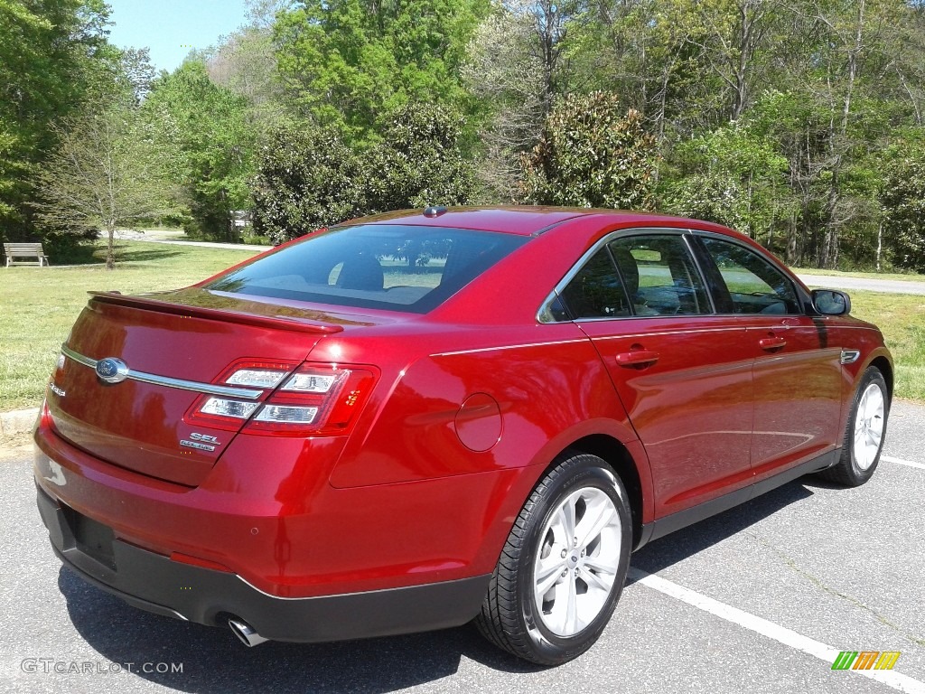 2016 Taurus SEL - Ruby Red / Charcoal Black photo #6