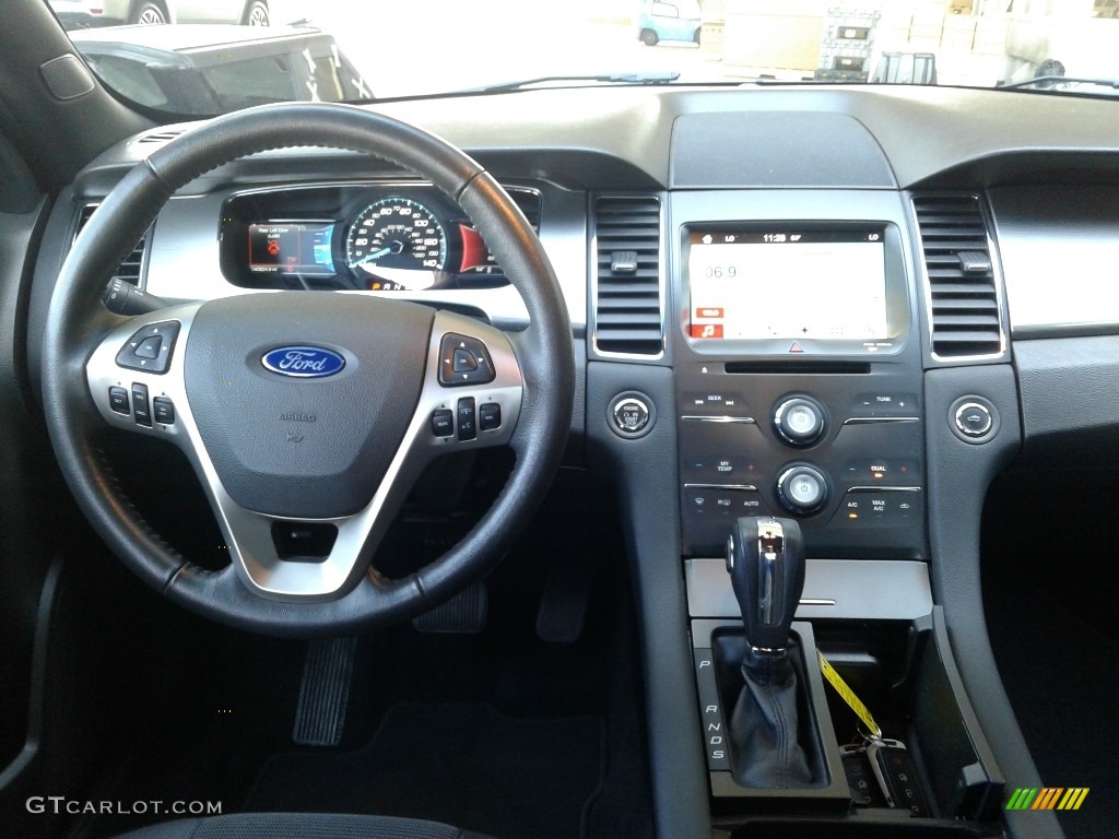 2016 Taurus SEL - Ruby Red / Charcoal Black photo #16