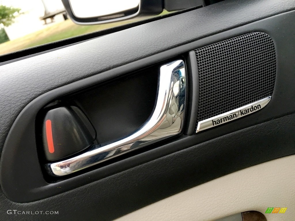 2009 Subaru Outback 2.5XT Limited Wagon Door Panel Photos