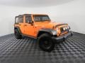 2012 Crush Orange Jeep Wrangler Unlimited Sport 4x4  photo #2