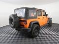 2012 Crush Orange Jeep Wrangler Unlimited Sport 4x4  photo #14