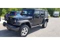 Black 2010 Jeep Wrangler Unlimited Sport 4x4