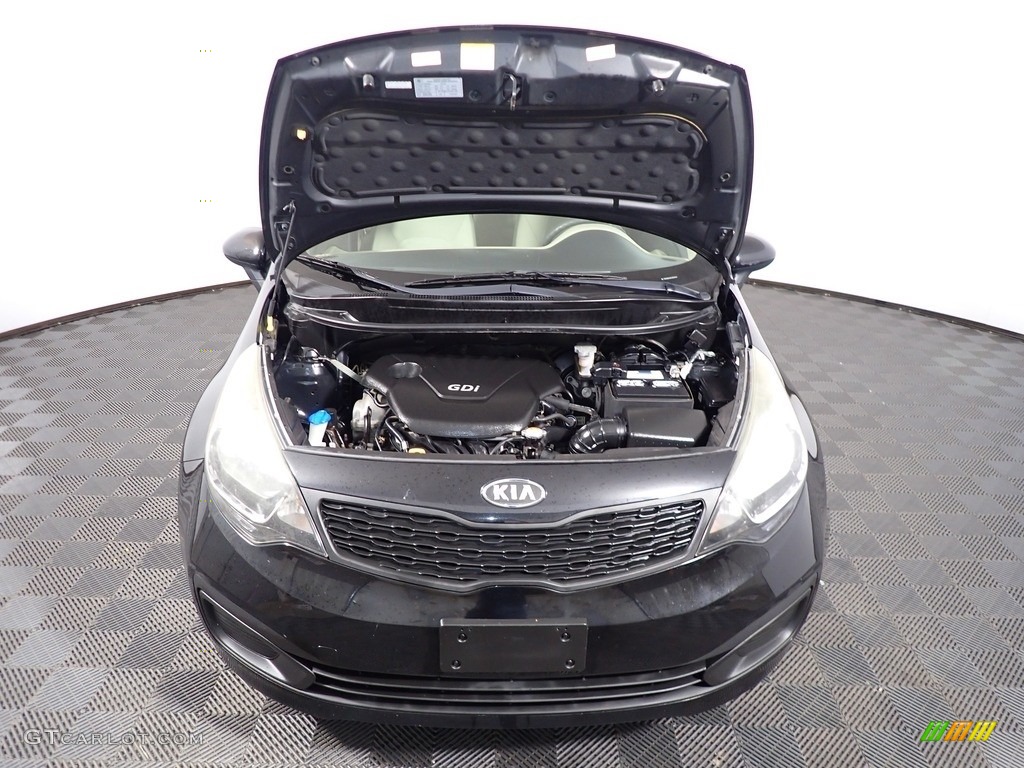 2012 Rio LX - Midnight Black / Beige photo #5