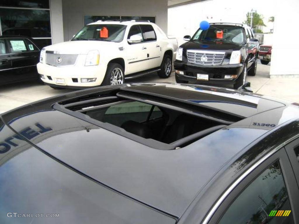 2009 CTS Sedan - Black Raven / Cashmere/Cocoa photo #5