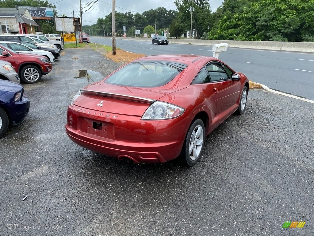 2009 Eclipse GS Coupe - Sunset Pearlescent Pearl / Dark Charcoal photo #2
