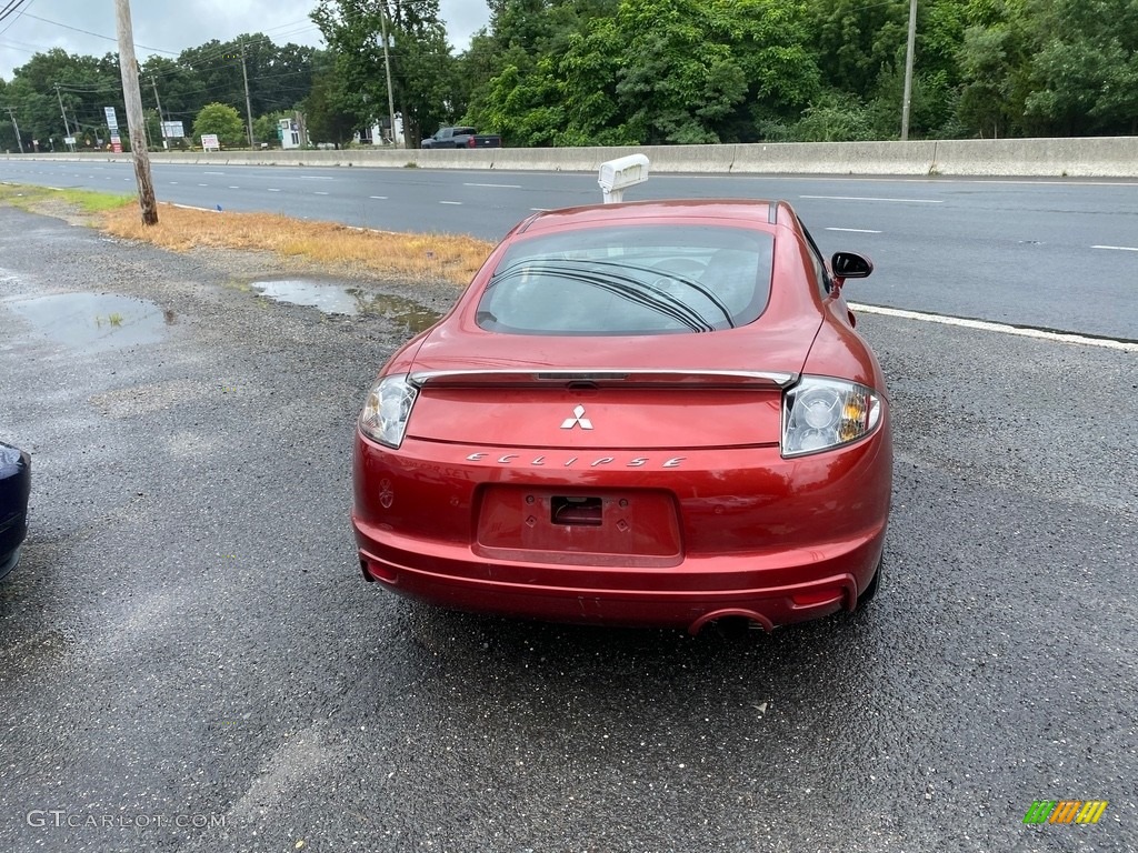 2009 Eclipse GS Coupe - Sunset Pearlescent Pearl / Dark Charcoal photo #3