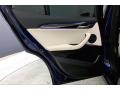 2020 BMW X2 Oyster/Black Interior Door Panel Photo