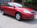 2006 Impulse Red Pearl Toyota Corolla LE  photo #1