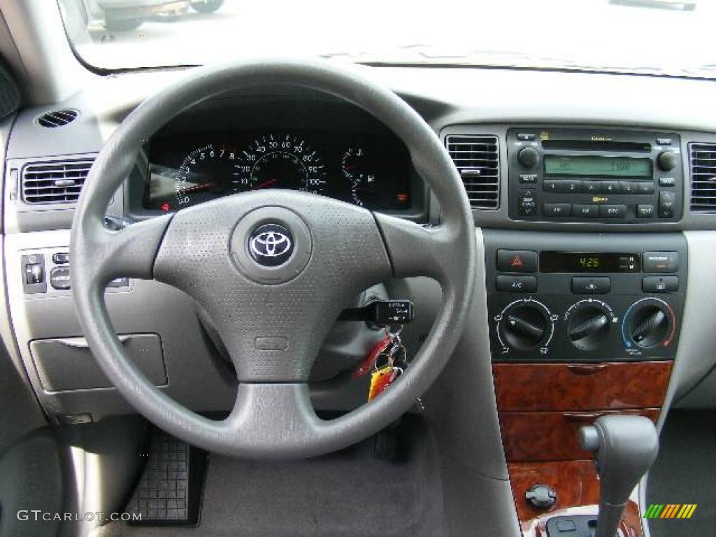 2006 Corolla LE - Impulse Red Pearl / Stone photo #14