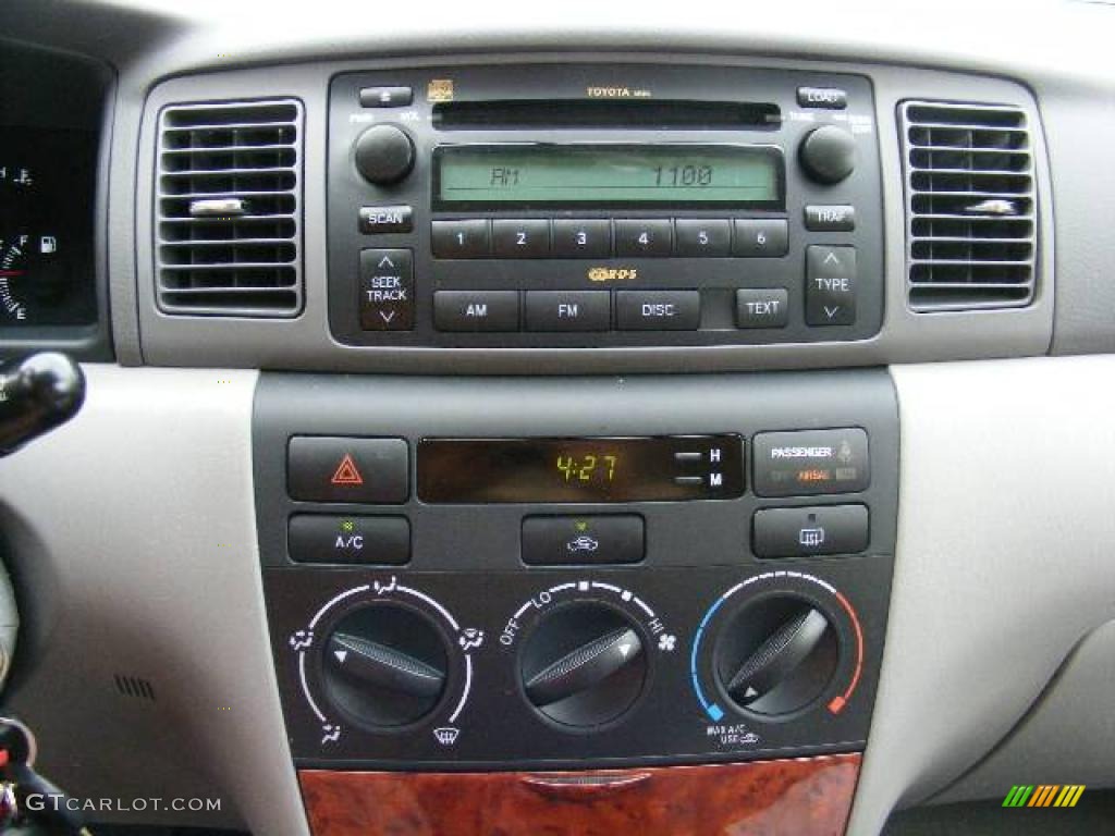 2006 Corolla LE - Impulse Red Pearl / Stone photo #18