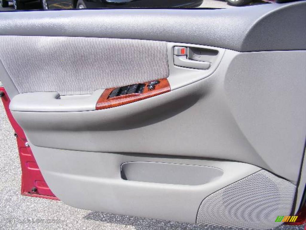 2006 Corolla LE - Impulse Red Pearl / Stone photo #23