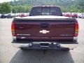 1999 Dark Carmine Red Metallic Chevrolet Silverado 1500 LS Extended Cab 4x4  photo #4