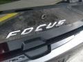 2009 Ebony Black Ford Focus SES Coupe  photo #11