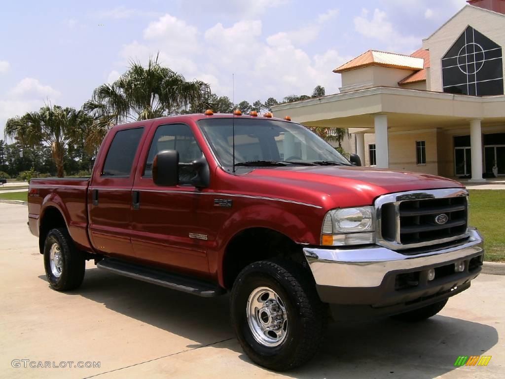 2003 F250 Super Duty Lariat Crew Cab 4x4 - Toreador Red Metallic / Medium Parchment Beige photo #1