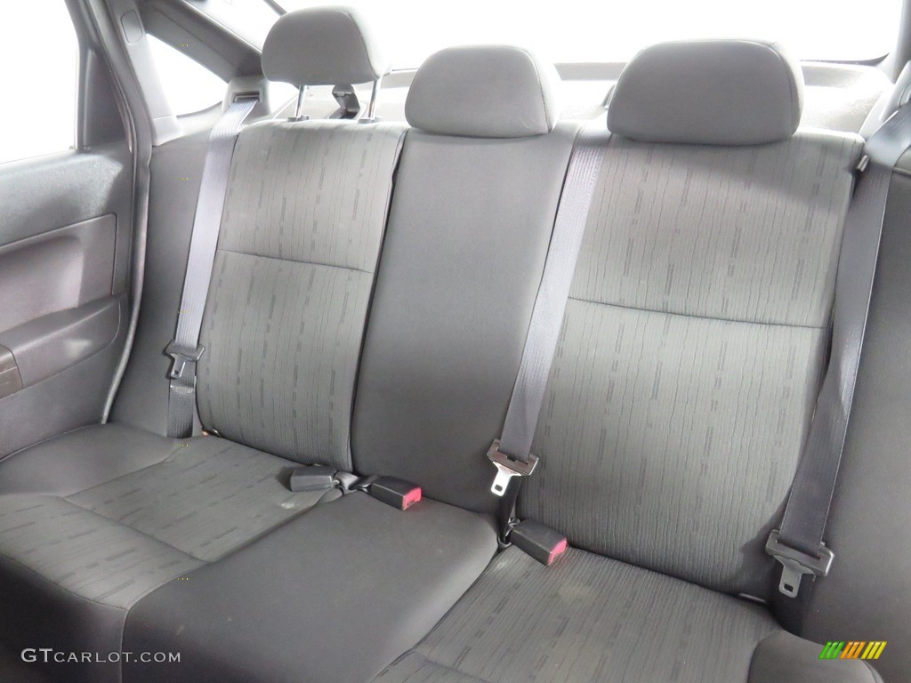 2010 Focus SE Sedan - Sterling Grey Metallic / Medium Stone photo #28
