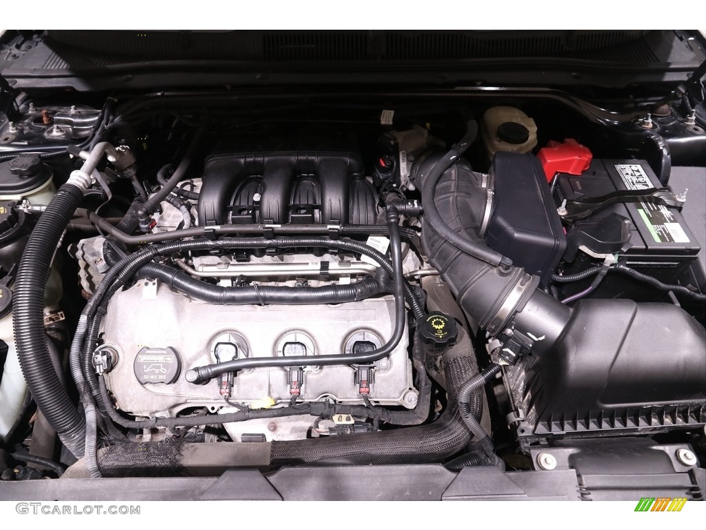 2010 Taurus Limited AWD - Tuxedo Black Metallic / Charcoal Black photo #17