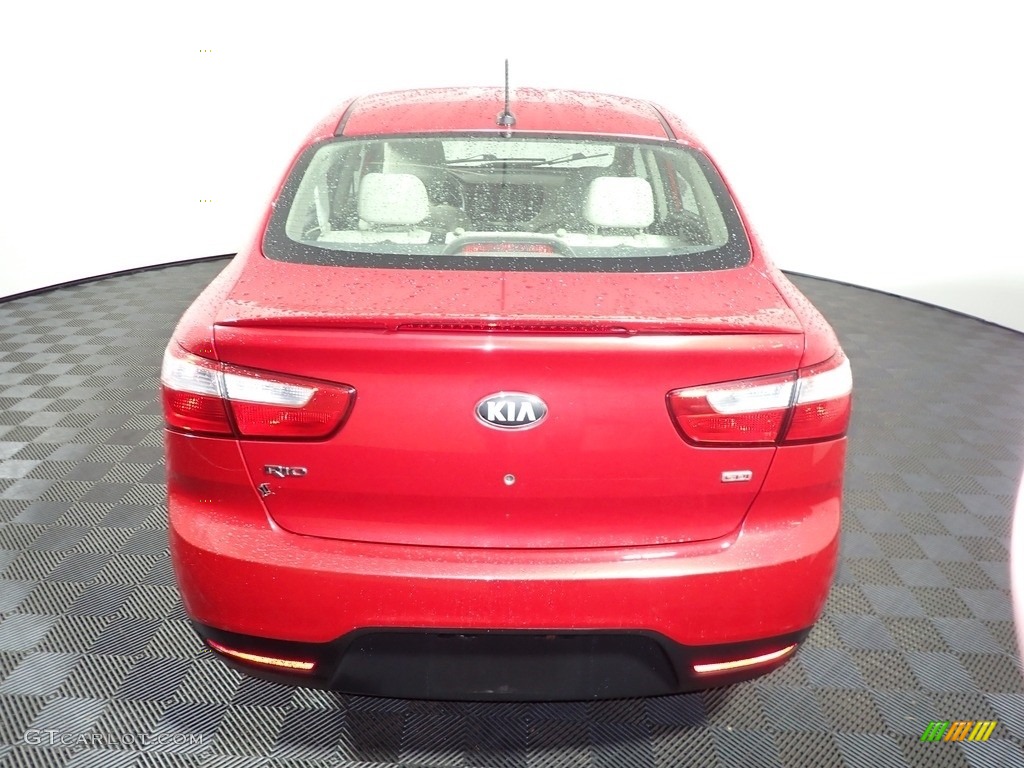 2013 Rio LX Sedan - Signal Red / Beige photo #11