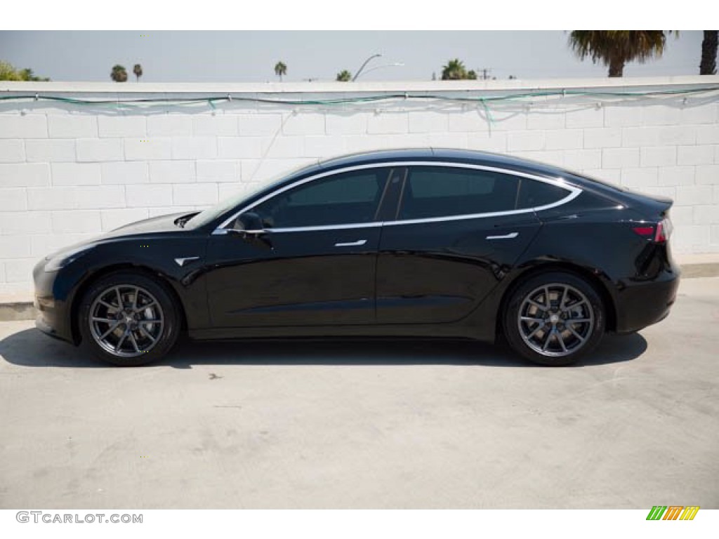 Solid Black 2019 Tesla Model 3 Standard Range Exterior Photo #139439493