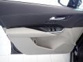 2020 Cadillac XT4 Light Wheat/Jet Black Interior Door Panel Photo