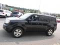 2011 Crystal Black Pearl Honda Pilot EX-L 4WD  photo #7