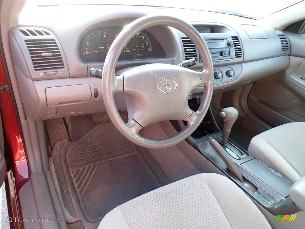 2004 Camry LE - Salsa Red Pearl / Stone photo #9
