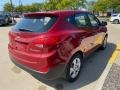 2011 Garnet Red Hyundai Tucson GL  photo #2