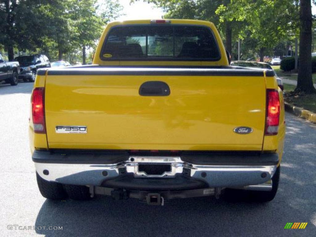 2006 F350 Super Duty Amarillo Edition Crew Cab 4x4 Dually - Blazing Yellow / Black photo #3