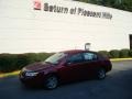 2005 Berry Red Saturn ION 2 Sedan  photo #1