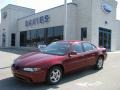 Redfire Metallic 2002 Pontiac Grand Prix SE Sedan