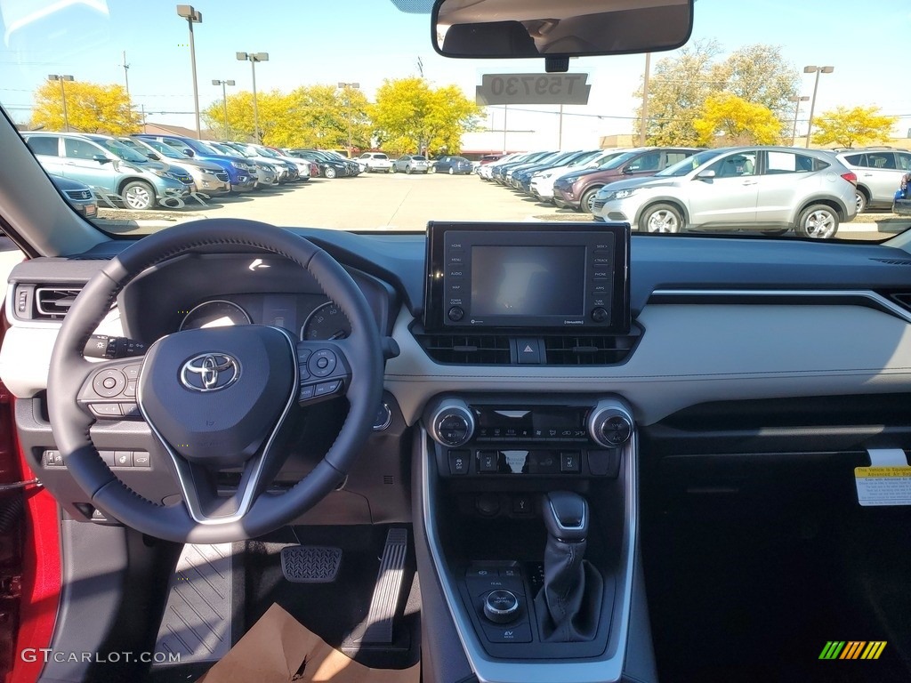 2021 Toyota RAV4 XLE AWD Hybrid Light Gray Dashboard Photo #139970515