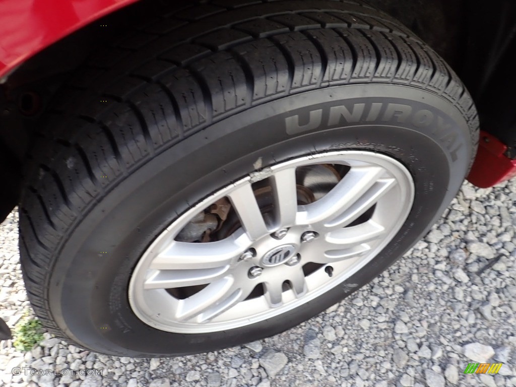 2010 Mercury Mariner V6 Premier 4WD Wheel Photos