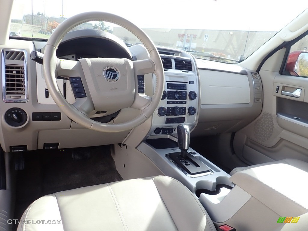 2010 Mariner V6 Premier 4WD - Sangria Red Metallic / Stone photo #10