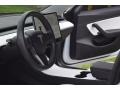 2018 Tesla Model 3 White/Black Interior Steering Wheel Photo