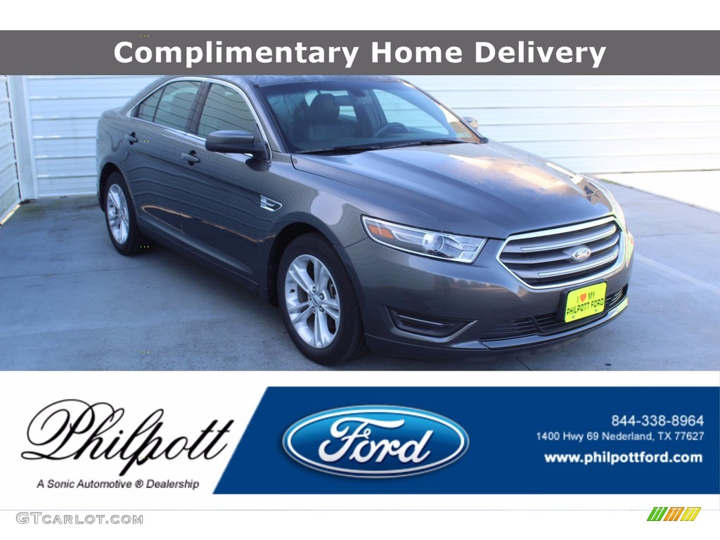 2018 Taurus SEL - Magnetic / Charcoal Black photo #1