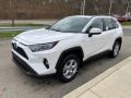 Front 3/4 View of 2021 RAV4 XLE AWD Hybrid