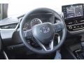 Black Steering Wheel Photo for 2021 Toyota Corolla #140628761