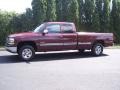 1999 Dark Carmine Red Metallic Chevrolet Silverado 1500 LS Extended Cab 4x4  photo #5