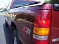 1999 Dark Carmine Red Metallic Chevrolet Silverado 1500 LS Extended Cab 4x4  photo #11