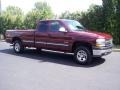 1999 Dark Carmine Red Metallic Chevrolet Silverado 1500 LS Extended Cab 4x4  photo #15