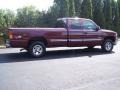 1999 Dark Carmine Red Metallic Chevrolet Silverado 1500 LS Extended Cab 4x4  photo #18