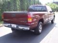 1999 Dark Carmine Red Metallic Chevrolet Silverado 1500 LS Extended Cab 4x4  photo #20