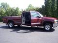 1999 Dark Carmine Red Metallic Chevrolet Silverado 1500 LS Extended Cab 4x4  photo #21