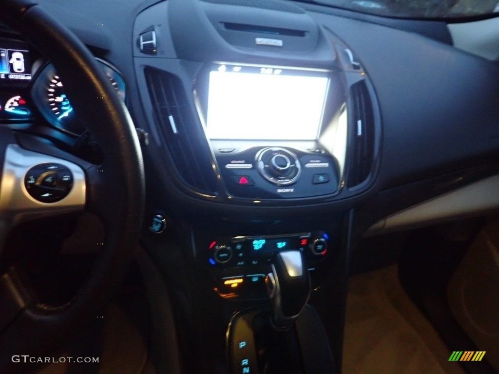 2016 Escape Titanium 4WD - Ruby Red Metallic / Medium Light Stone photo #22