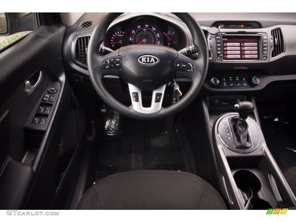 2011 Sportage LX - Sand Track / Black photo #5