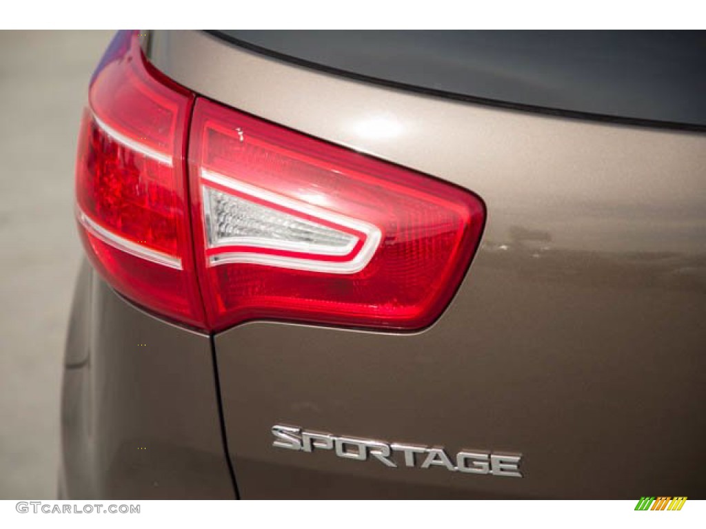 2011 Sportage LX - Sand Track / Black photo #12